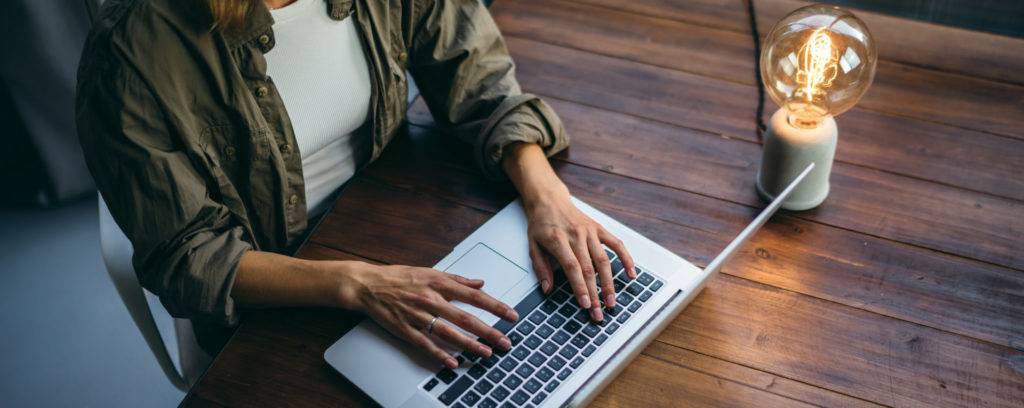 Young woman working with a laptop.